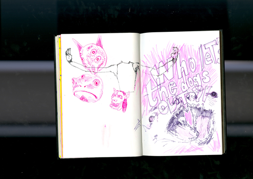 scann d'une page de mon carnet de croquis, dessin de 2 chiens avec des masques japonais.